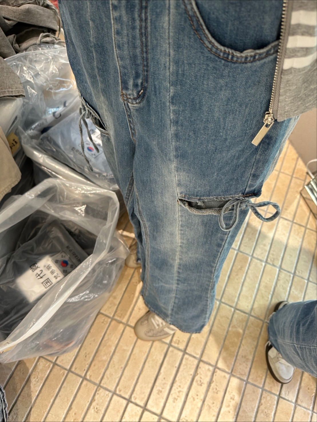 側綁帶鏤空蝴蝶結喇叭褲